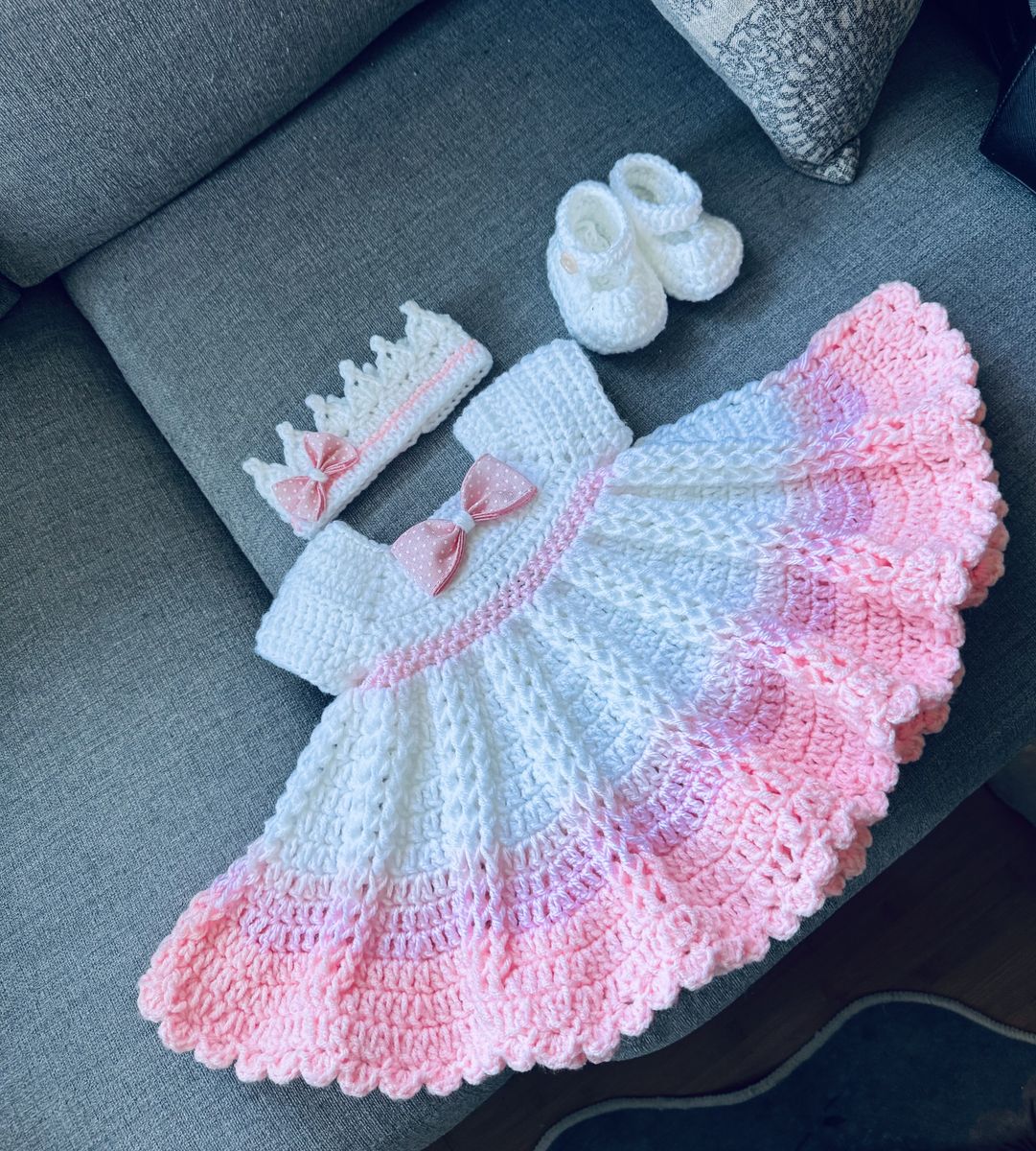 Pink and white crochet baby dress set with a hat and shoes