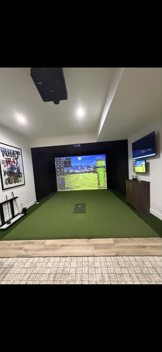 Full Indoor Golf Simulator Setup with Impact Screen and Projector