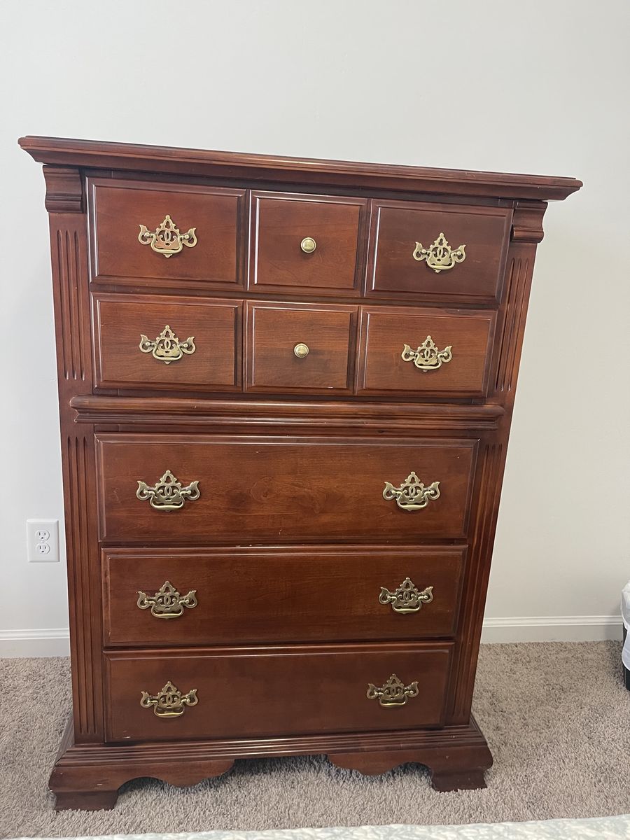Traditional Wooden Dresser with Multiple Drawers and Brass Hardware