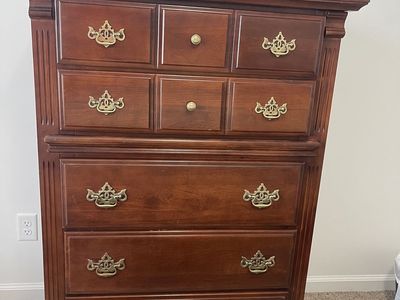 Traditional Wooden Dresser with Multiple Drawers and Brass Hardware