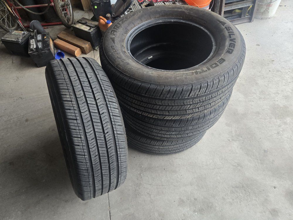Set of 235 65 16" Tires  LIKE NEW