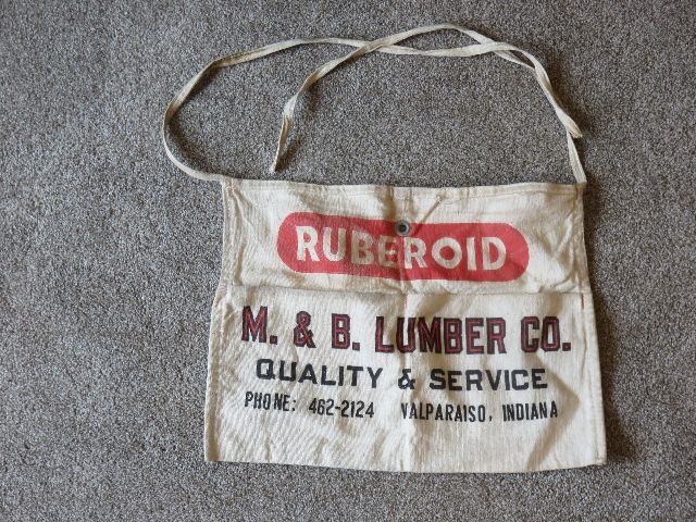 A VINTAGE 1940'S WORK APRON FROM THE M&B LUMBER COMPANY IN VALPARISIO, INDIANA