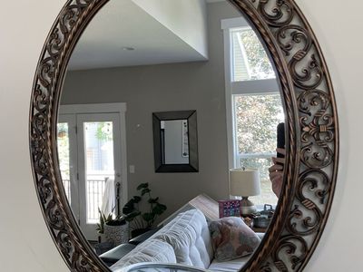 27” mirror including ornate brown bronze frame