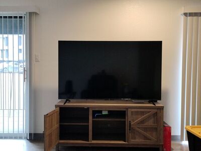 Entertainment Center with 65" 4K Ultra HD TV