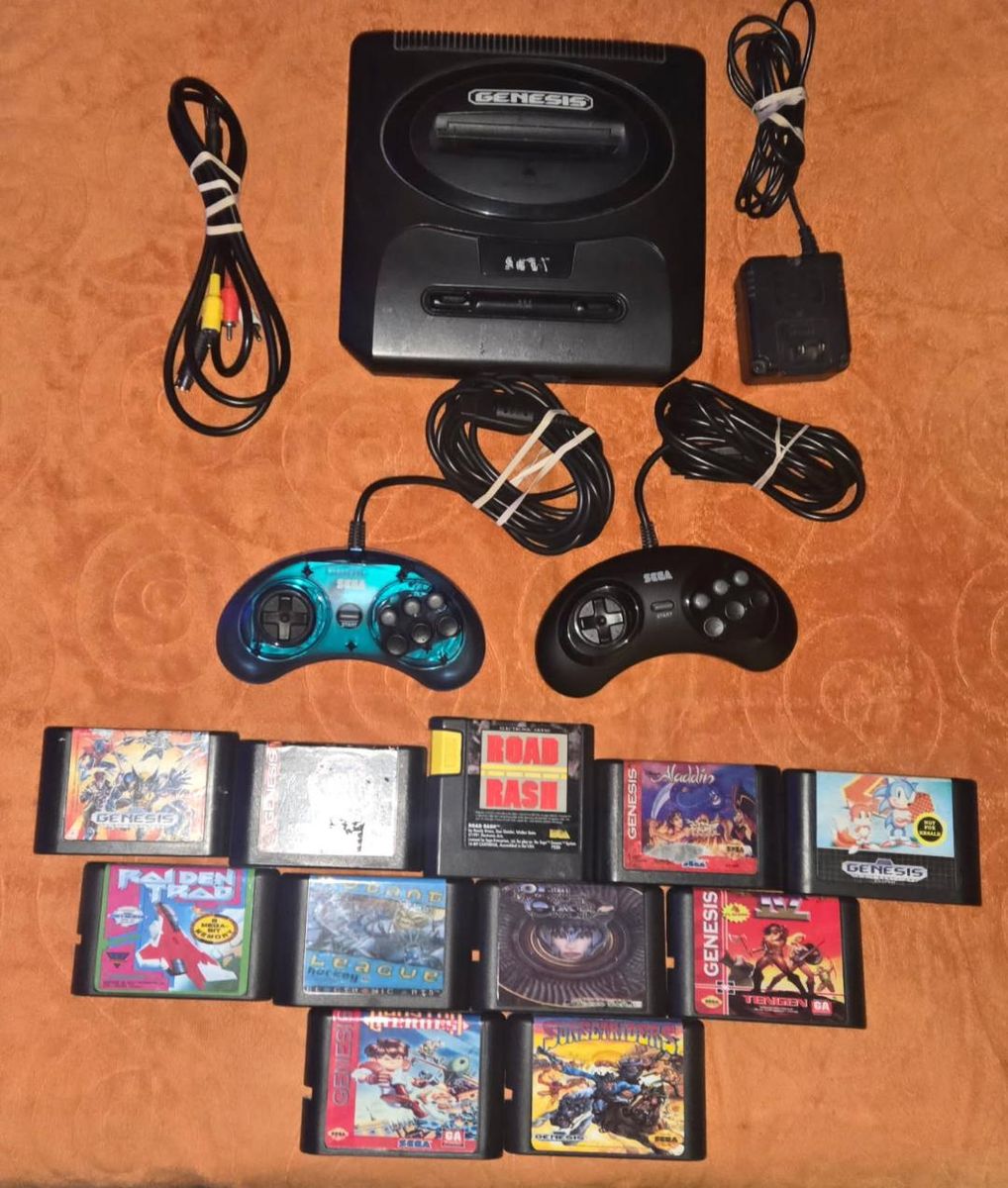 Sega Genesis II with 2 controllers and 11 games!  Trades considered!