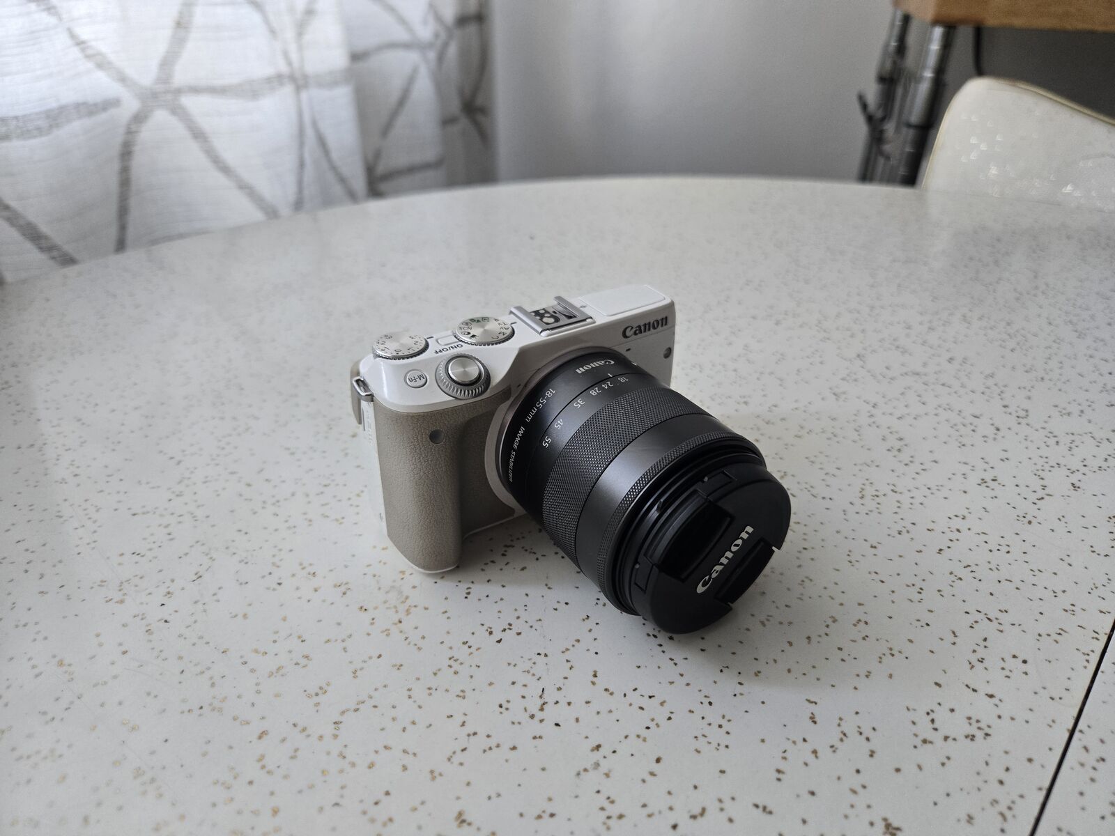 Canon M2 mirrorless camera and lens