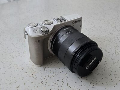 Canon M2 mirrorless camera and lens