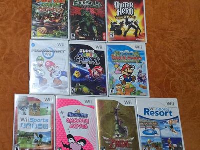 Nintendo Wii game bundle including Wii Sports Resort! Trades considered~!
