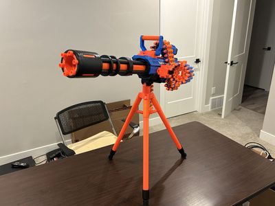 Zuru X-Shot Insanity Blaster mini-gun with Tripod - Motorized Belt-Fed Dart Blaster Toy Gun - Nerf