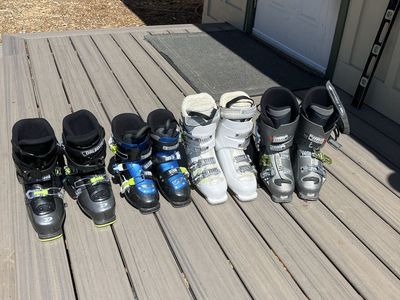 Family ski boots, skis, and Poles