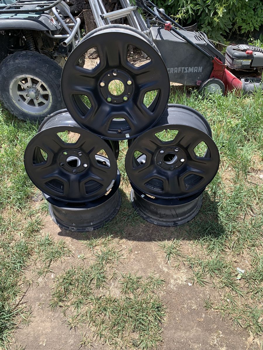 Set of 5 jeep rubicon stock rims