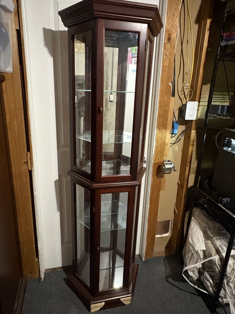 Reddish brown curio cabinet