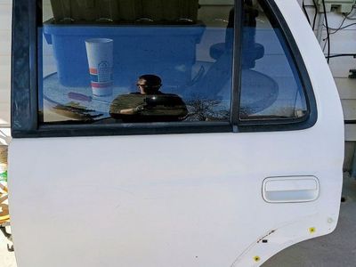 OEM rear driver and rear passenger doors removed from a 1997 Toyota 4Runner Limited.