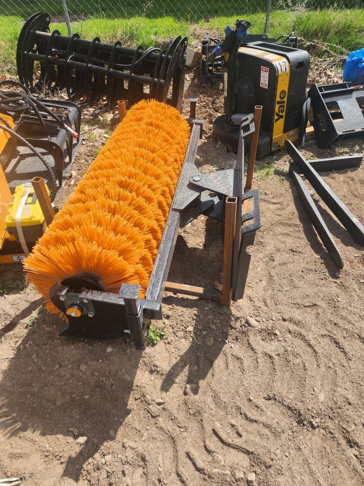 new skid steer mounted broom