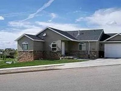 For RENT 103 Alecia’s Way in Evanston Wyoming 5 bedroom 3 full bath Home with 2 car garage on corner lot