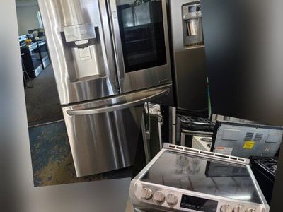 Lg refrigerator and slide-in electric stove