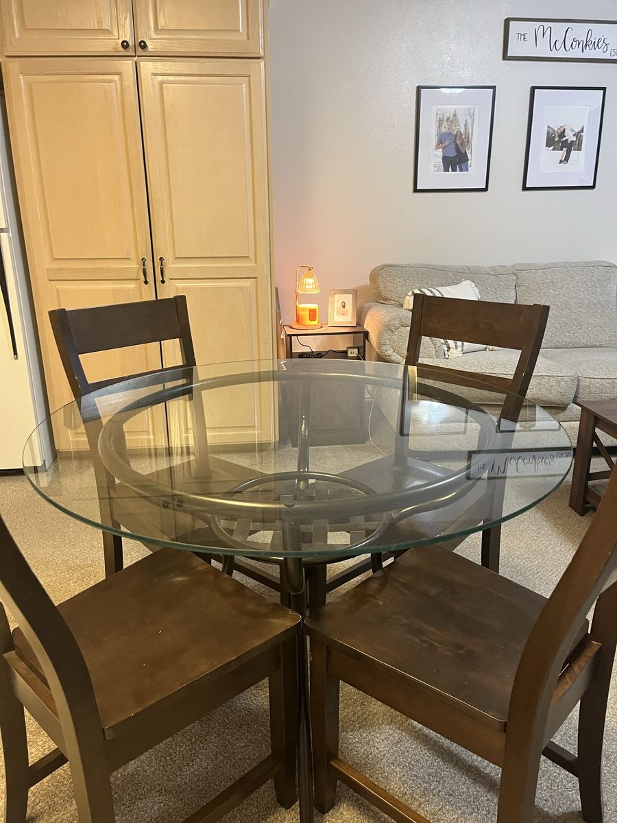 Glass dining table + 4 chairs