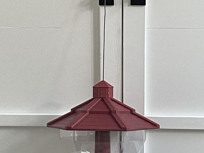 Gazebo bird feeder holds up to 6 lbs of bird food