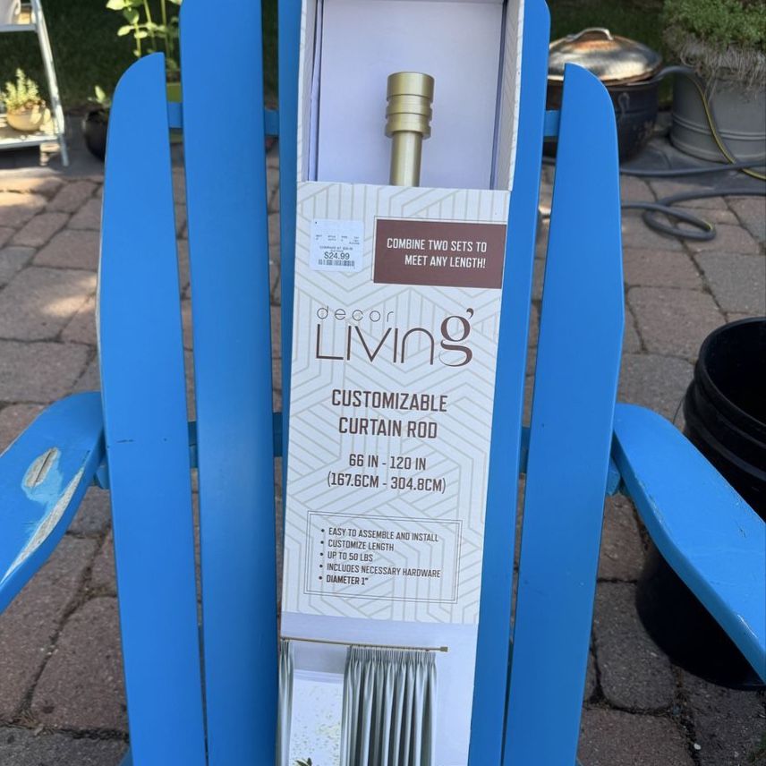 New in box…brushed gold curtain rod