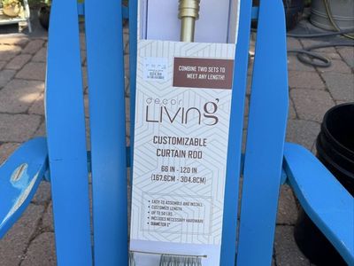 New in box…brushed gold curtain rod