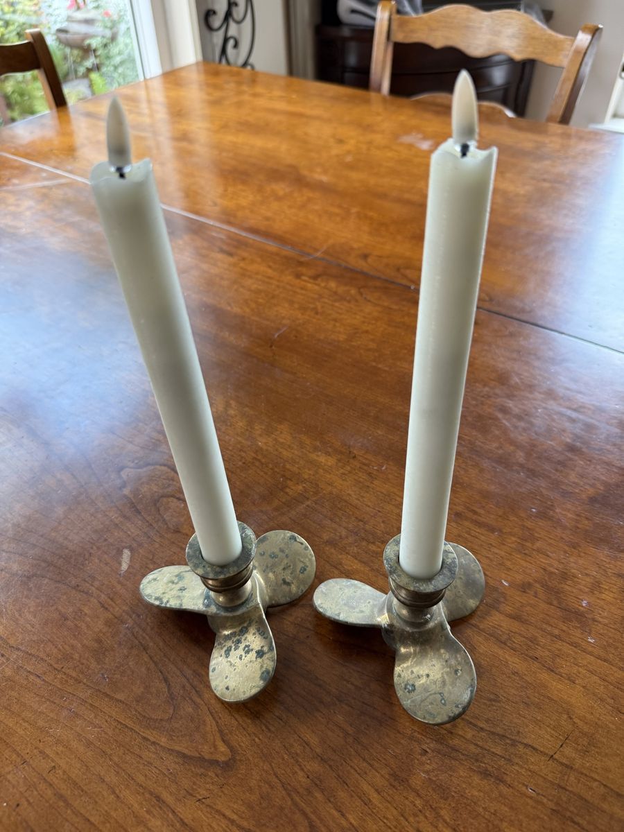Vintage set of 2 solid brass boat propeller candle holders candles not included. 4.5” W