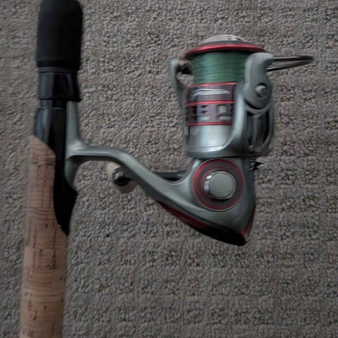 Pflueger president XT 30 with Shimano scrimitar rod
