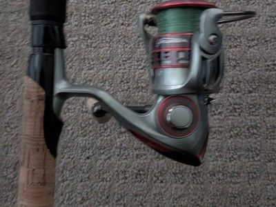 Pflueger president XT 30 with Shimano scrimitar rod
