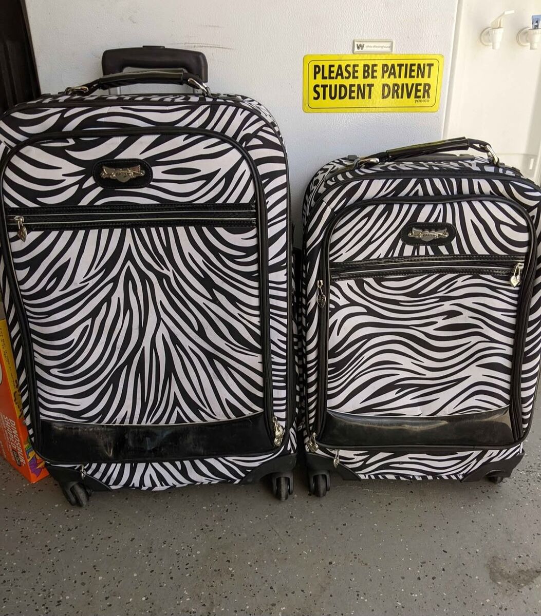 Zebra Kathy van Zeeland rolling suitcases great condition