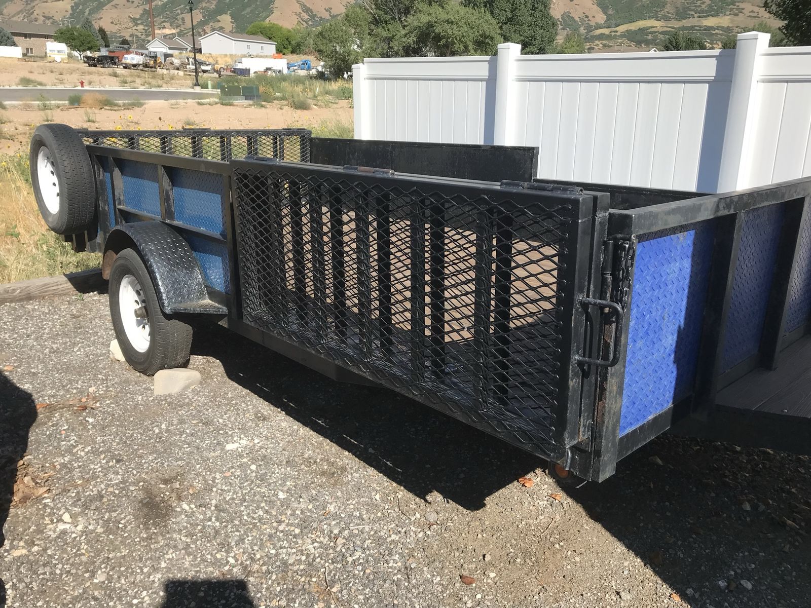 14 foot Single Axle Utility/ ATV Trailer with Fold-Down Ramp Gate and Mounted Spare Tire