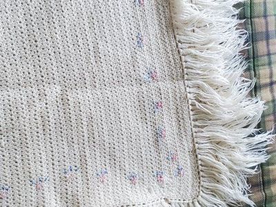 Vintage Hand-Crocheted Cream Baby Blanket with Floral Embroidery and Fringe