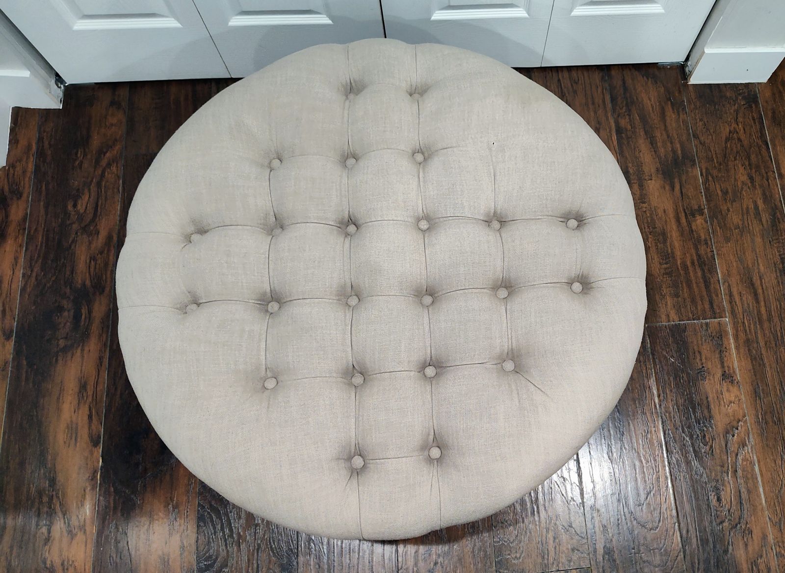Tufted Ottoman / Coffee Table with Nailhead Trim and Black Wooden Legs