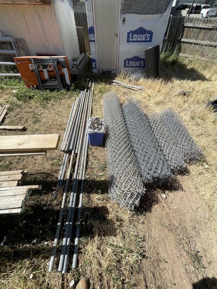Chain link fence and rolling gate