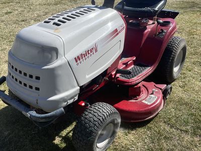 White Horse Riding Lawnmower