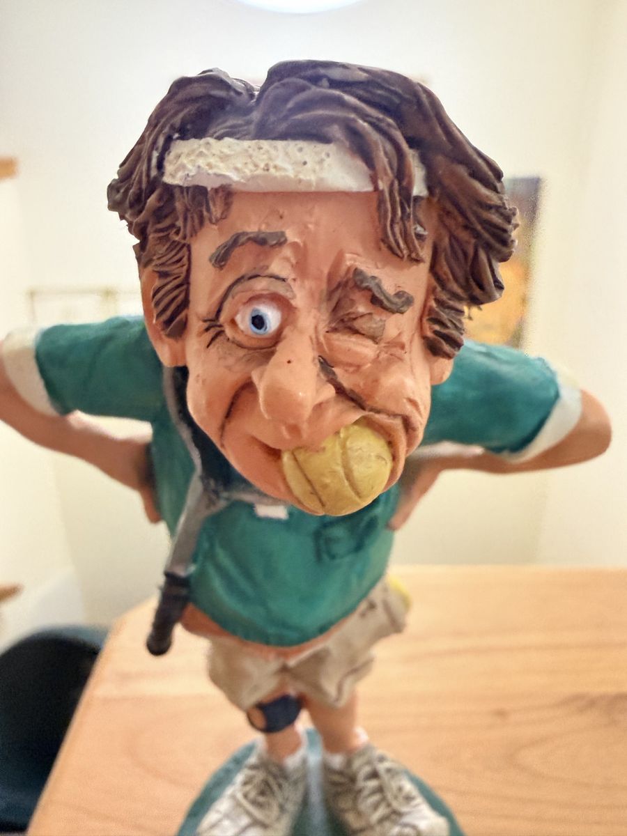 Funny Caricature Tennis Player Figurine Statue with Balls 2000 collectible, “making a racket”