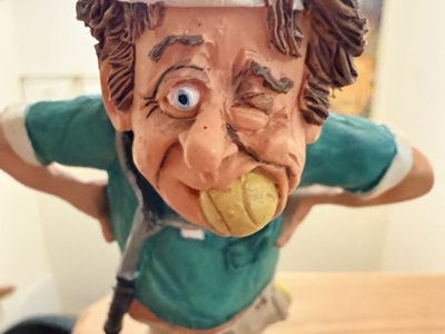 Funny Caricature Tennis Player Figurine Statue with Balls 2000 collectible, “making a racket”