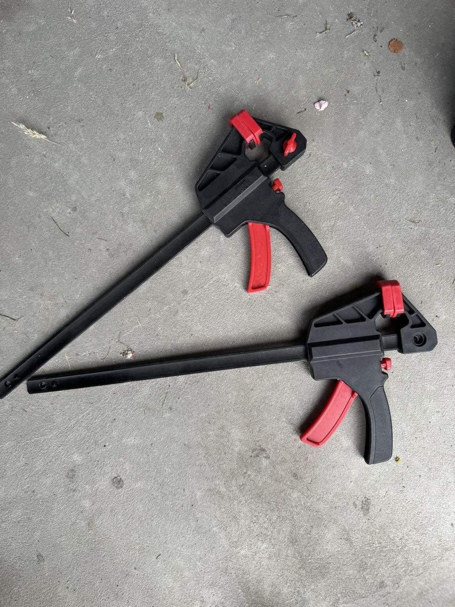 Two Used Bar Clamps - Red & Black, Various Sizes