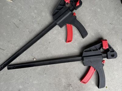 Two Used Bar Clamps - Red & Black, Various Sizes
