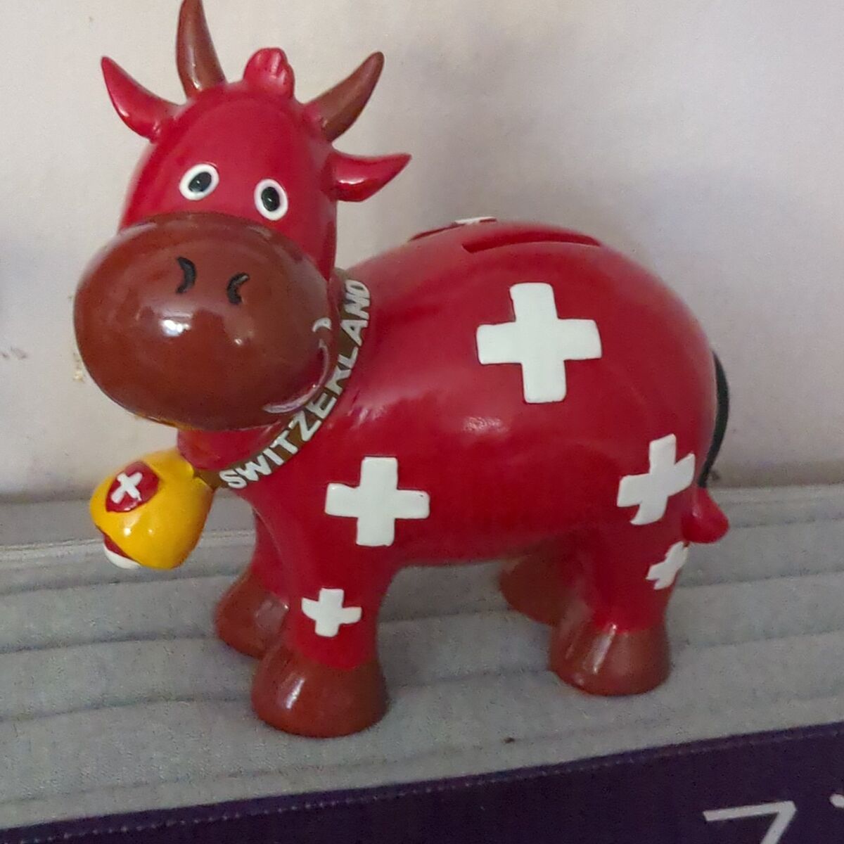 Switzerland red cow piggy bank