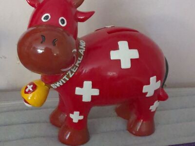 Switzerland red cow piggy bank
