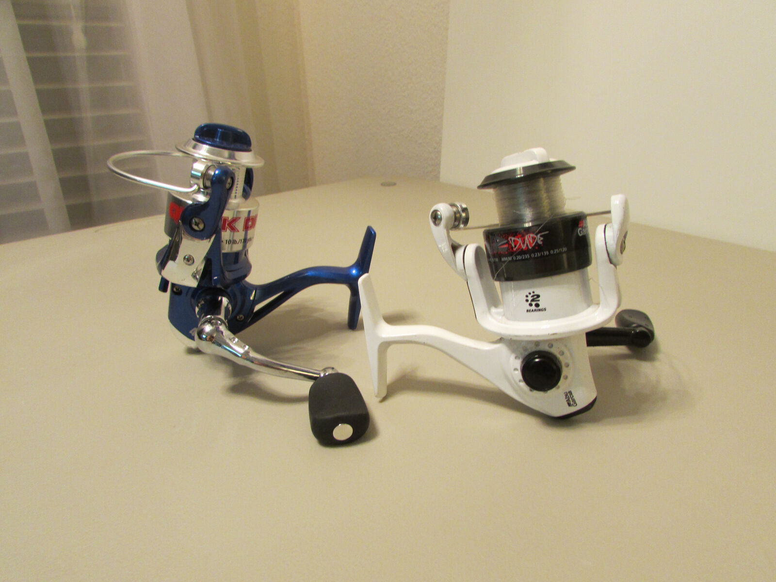 (two) fishing reels