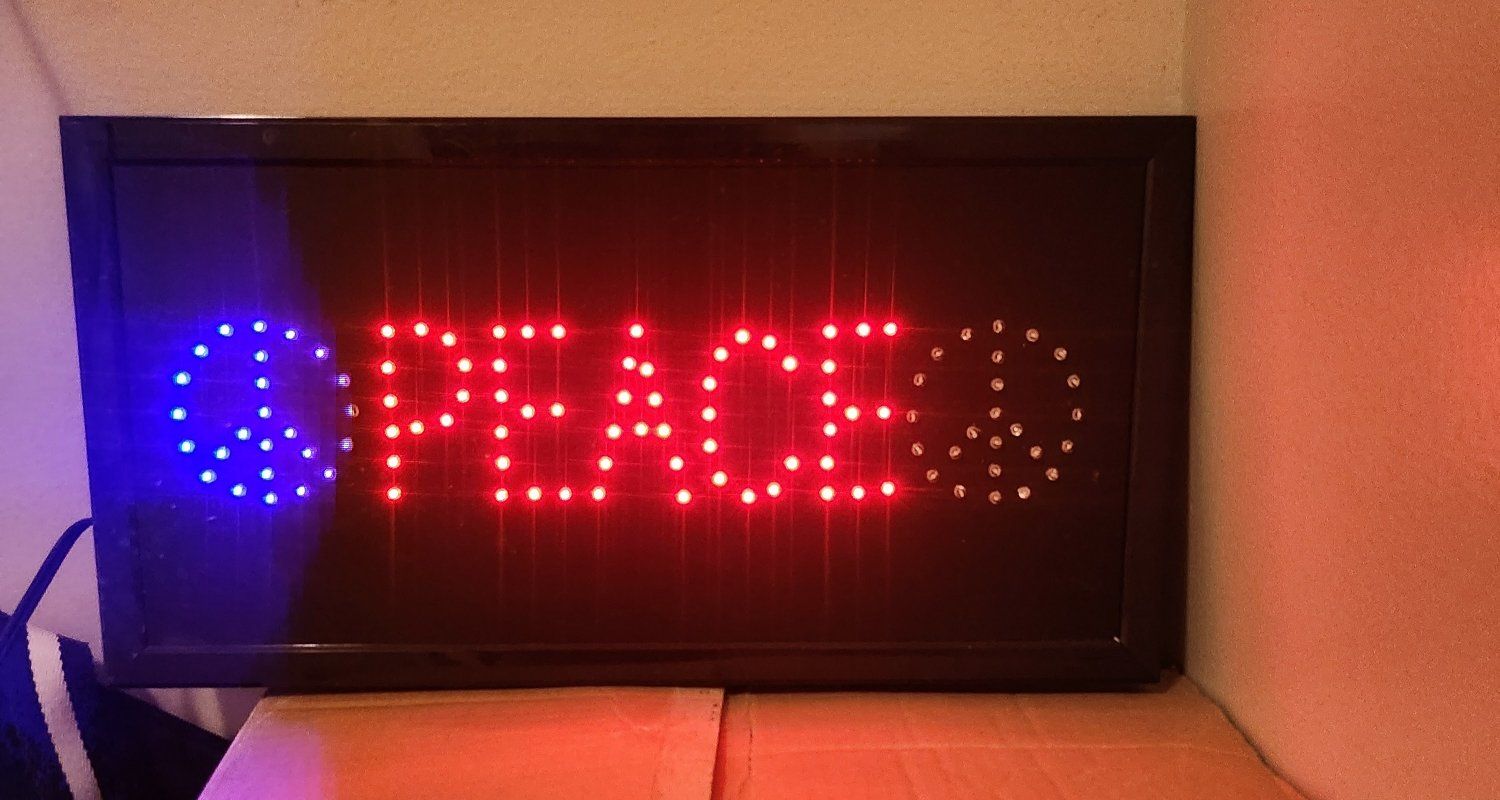 Unique "PEACE" LED Light Up Sign - Red & Blue Peace Symbol Decor