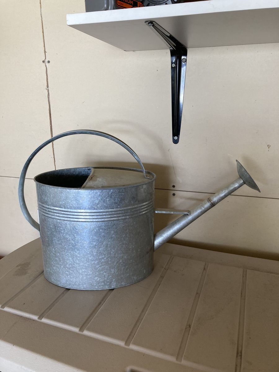 Metal watering can