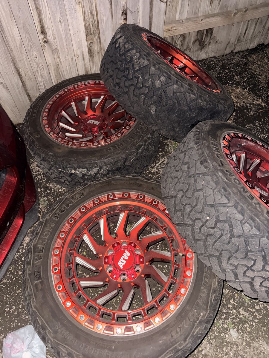 Red rims and tire