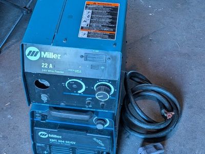 Miller XMT 304 CC/CV Multiprocess Welder with 22A 24V Wire Feeder - Heavy-Duty Industrial Welding