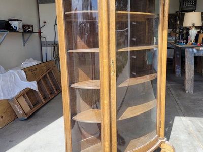 Antique glass curio cabinet