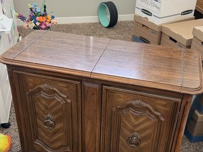 Vintage Wooden Sewing Machine Cabinet with Fold-Out Table Top and Storage