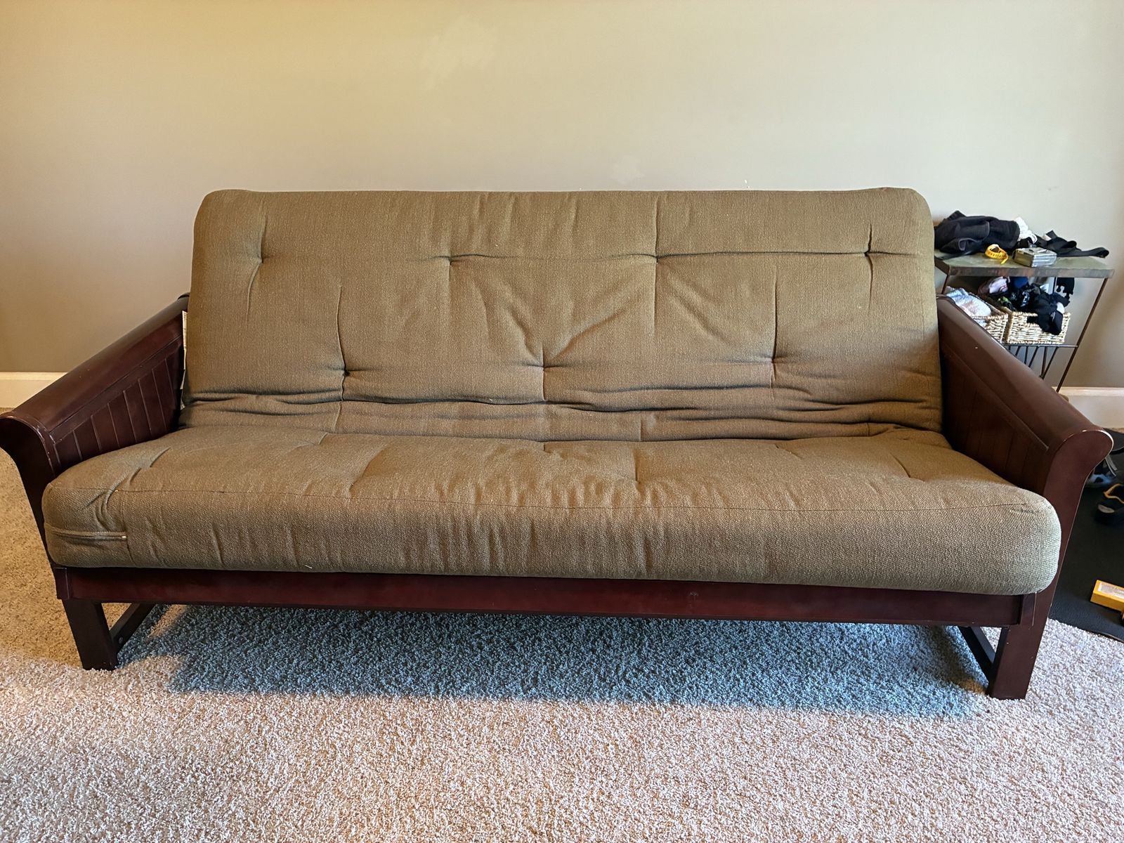 Full sized “comfort” futon with a 7 inch mattress and solid wood frame 