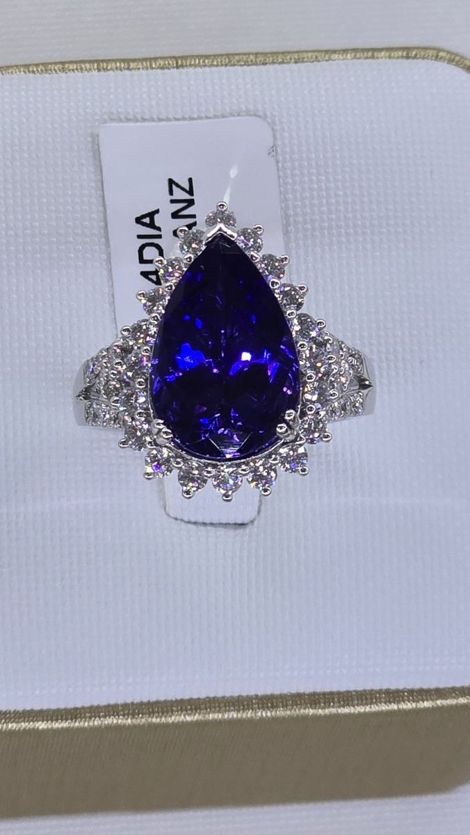 Platinum 6.30ct Pear Tanzanite and 1.14ct Diamond Halo Ring GIA Certified