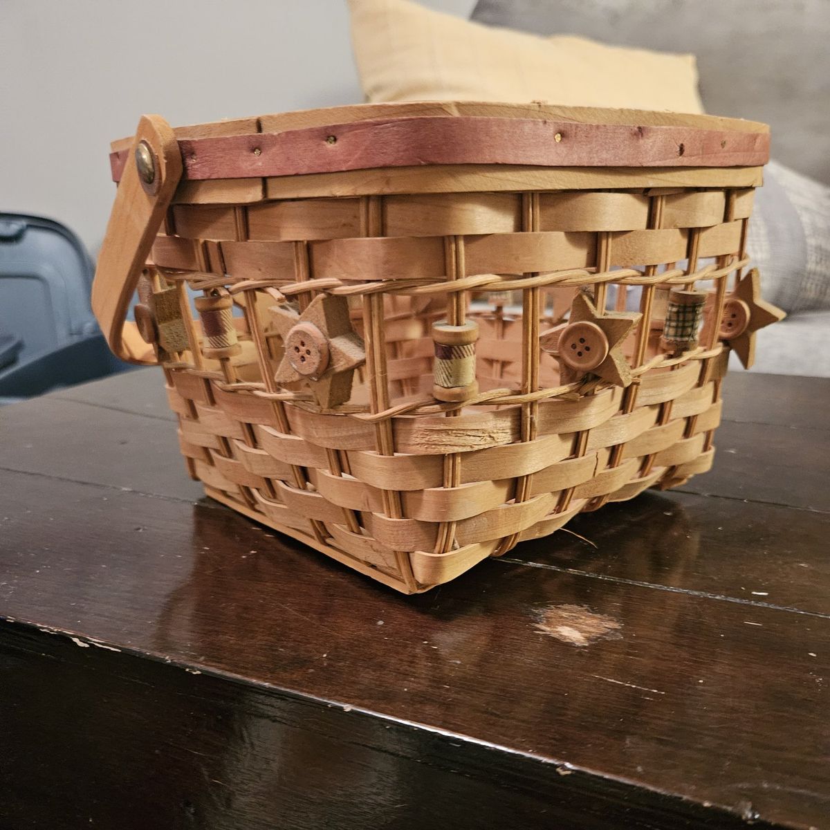 Basket with handle, spools, button, star