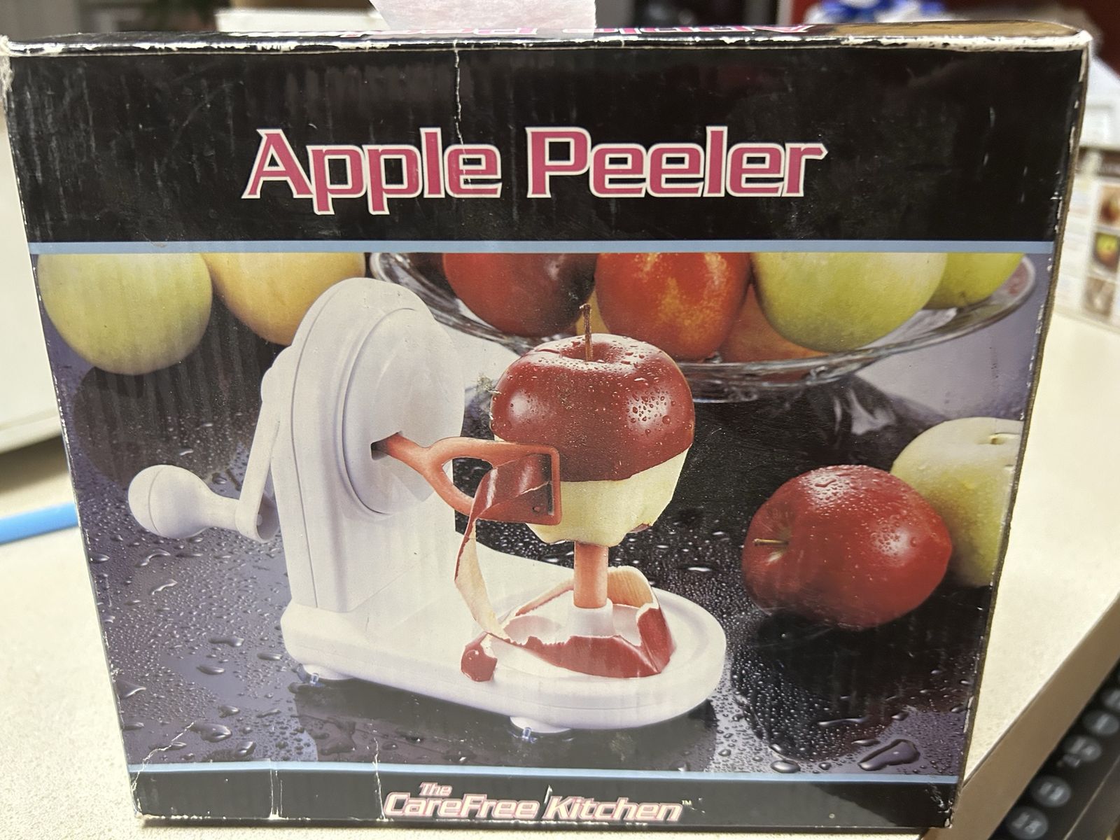 The CareFree Kitchen Apple Peeler Spin N' Peel Manual Countertop Suction Base Peeler
